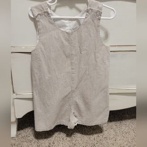 Tan and white boy shortall